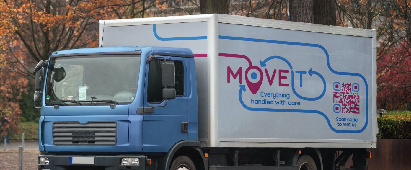 Moving truck with a QR Code that links to an online booking platform.
